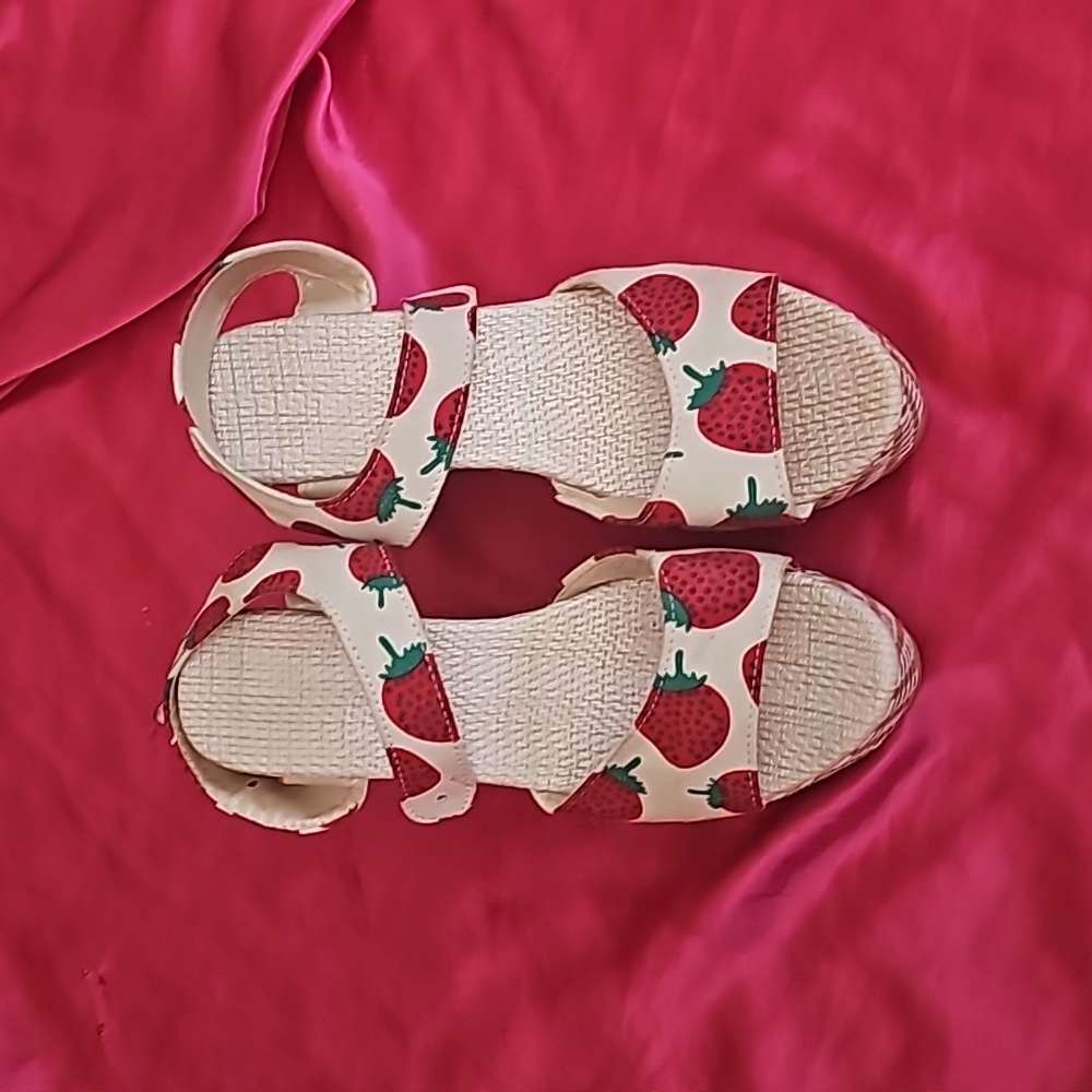 Never worn strawberry platforms.